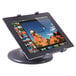 A Kantek black swivel base tablet stand holding a tablet on a counter.