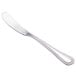 A Walco stainless steel butter spreader with a handle.