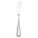 A Walco stainless steel butter spreader with a handle.
