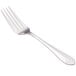 A close-up of a Walco Meteor stainless steel dinner fork with a silver handle.