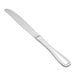 A Walco Saville stainless steel dinner knife with a white background.