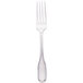 A silver Walco Saville dinner fork with a white background.