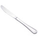 A close-up of a Walco Lisbon stainless steel dinner knife with a silver handle.