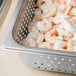 A Choice stainless steel steam table pan filled with shrimp.