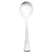 A silver spoon with a white handle.