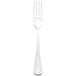 A close-up of a Walco Lisbon heavy weight European table fork with a white handle.