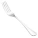 A close-up of a Walco Lisbon stainless steel table fork.