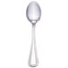 A Walco stainless steel teaspoon with a silver handle.