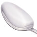 A Walco stainless steel serving spoon with a silver handle.