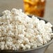 A bowl of Reist Blue Butterfly popcorn kernels.