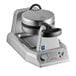 A Waring single Belgian waffle maker on a school kitchen counter.