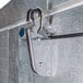A metal latch on a Norlake Kold Locker door.