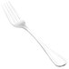 A close-up of a Walco stainless steel dinner fork with a white handle.