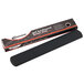 A gray gel wrist rest for a keyboard.