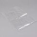 A clear plastic bag of Inteplast Group ice bucket liners on a white surface.