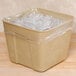 A clear plastic bag filled with ice inside a large square container.