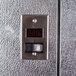 A metal door with a digital temperature display.