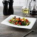 A salad in a white Villeroy & Boch Modern Grace bone porcelain deep plate.