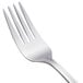 The handle of a Walco Marcie salad fork with a silver finish.