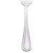 A Walco stainless steel salad fork with a white handle.