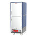 A blue Metro C5 holding cabinet with white Dutch doors.