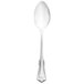 A Walco stainless steel serving spoon with a silver handle.