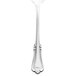 A close-up of a Walco Barony stainless steel serving spoon with a handle.
