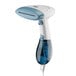 A Conair white handheld steamer.