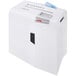 A white HSM ShredStar X10 shredder with blue paper in it.