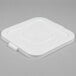 A white plastic Continental lid with a black circle clip.