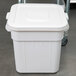 A Continental white plastic bin lid on it.