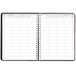 A black House of Doolittle appointment book with a white cover on a white background.