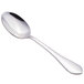 A close-up of a Walco stainless steel serving spoon with a black handle.