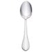 A Walco stainless steel serving spoon with an ironstone handle.