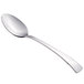 A close-up of a Walco stainless steel teaspoon with a silver handle.