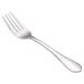 A Walco stainless steel dinner fork with a textured silver handle.