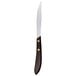 A Libbey steak knife with a black POM handle.