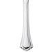 A Walco stainless steel table knife with a solid handle.