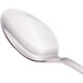 A close-up of a Walco stainless steel iced tea spoon with a silver handle.