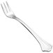 A Walco stainless steel cocktail fork with a silver handle.