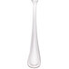 A close-up of a Walco stainless steel flat handle butter spreader.