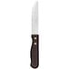 A Libbey stainless steel steak knife with a black polypropylene handle.