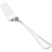 A close-up of a Walco stainless steel flat handle fish fork with a silver handle.