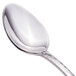 A close-up of a Walco 18/10 stainless steel iced tea spoon with a silver handle.