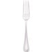 A close-up of a Walco stainless steel table fork with a silver handle.