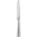 A silver Libbey steak knife with a serrated edge.