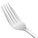 A close-up of a Walco Freya salad fork with a silver handle.