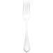 A close-up of a Walco stainless steel salad fork with a white handle.
