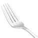 A close-up of a Walco stainless steel salad fork with a silver handle.