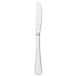 A silver butter knife with a white solid handle.